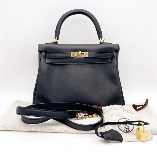 Preloved Hermes Black n Gold Kelly 25