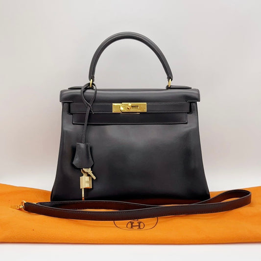 Preloved Hermes Vintage Black n Gold Kelly 28