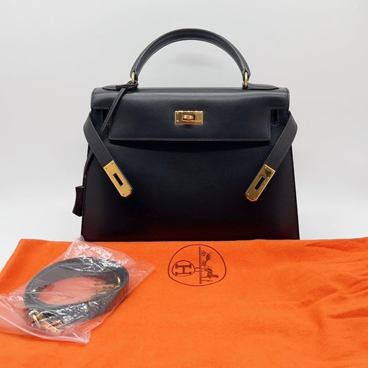 Preloved Hermes Vintage Black n Gold Kelly 28