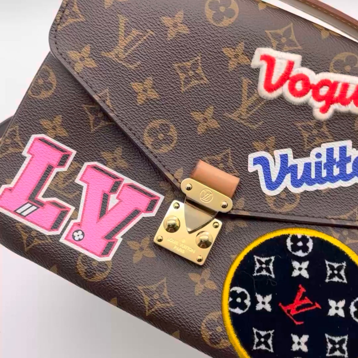 lv bag with patches