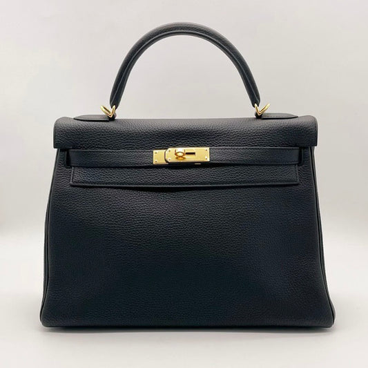 Preloved Hermes Black n Gold Kelly 32