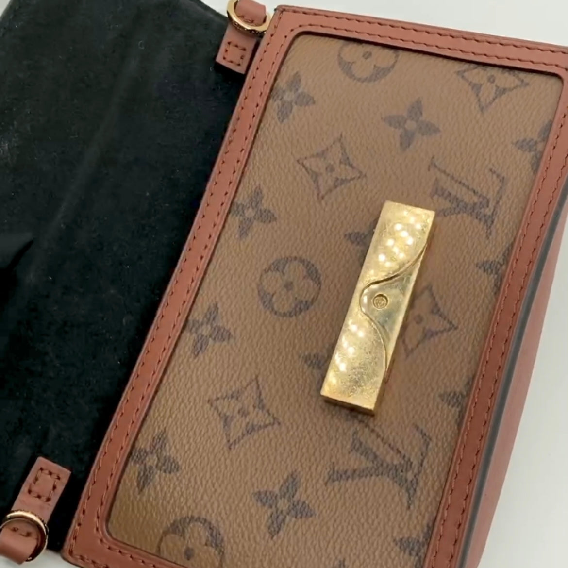 Products by Louis Vuitton: Dauphine Chain Wallet  Wallet chain, Louis  vuitton, Louis vuitton store