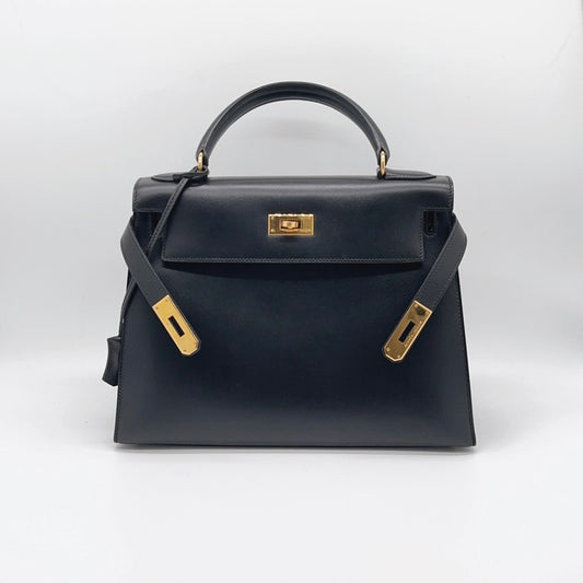 Preloved Hermes Vintage Black n Gold Kelly 28